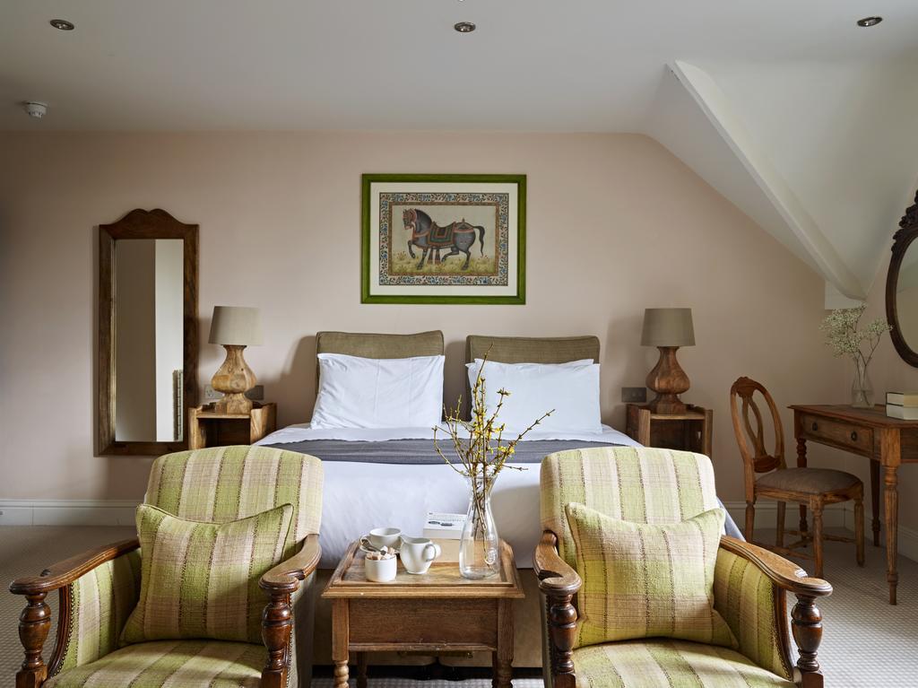 Bed and Breakfast Cotswold Grange Челтенхам Экстерьер фото A bedroom at the hotel