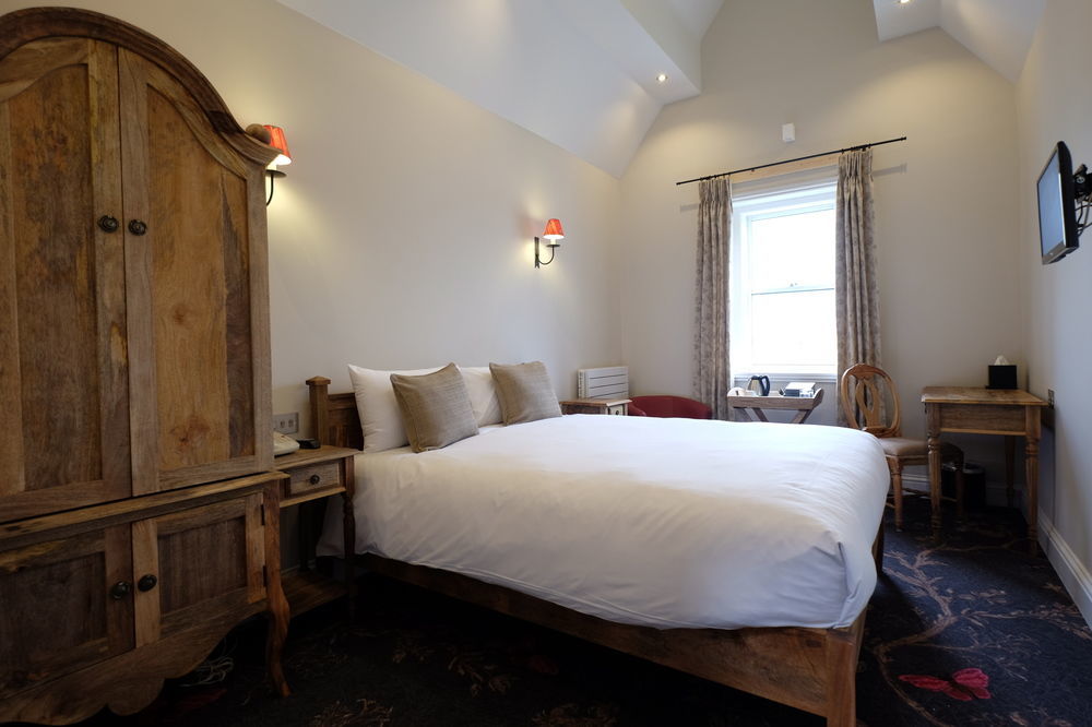 Bed and Breakfast Cotswold Grange Челтенхам Экстерьер фото A room at the hotel