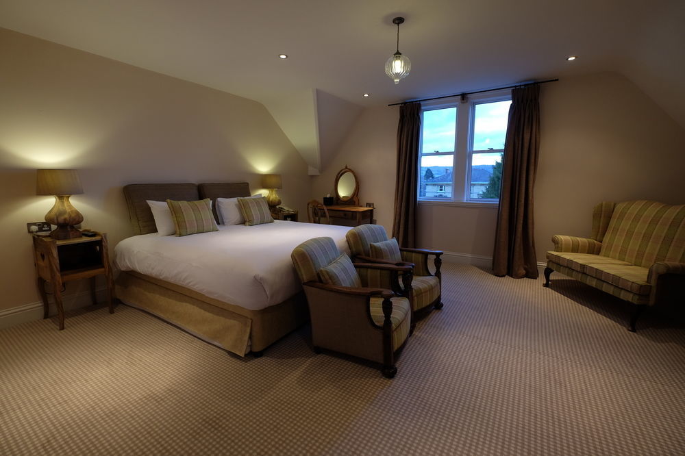 Bed and Breakfast Cotswold Grange Челтенхам Экстерьер фото A bedroom at the hotel